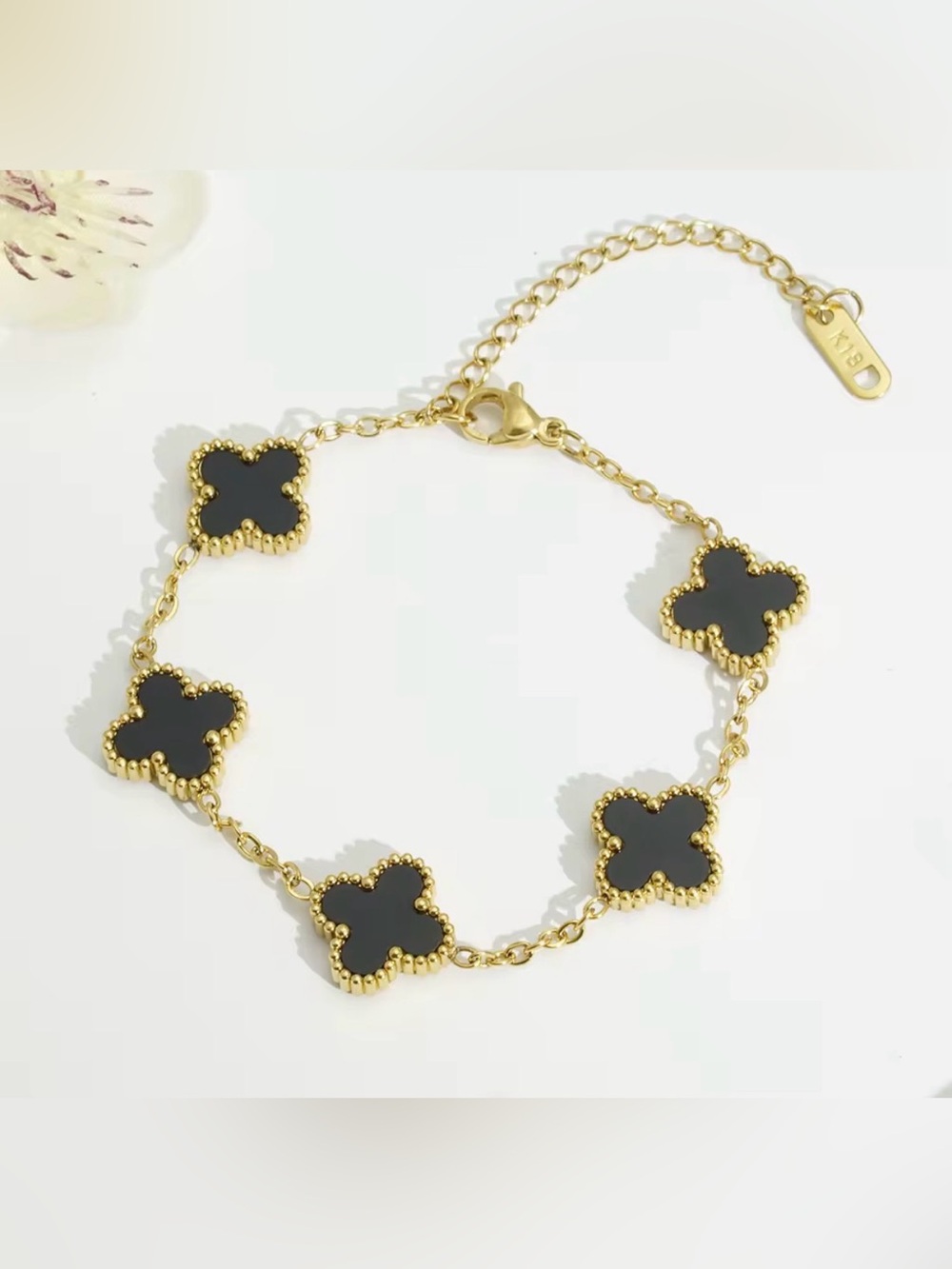 Gold Clover Link Bracelet with Black Accents